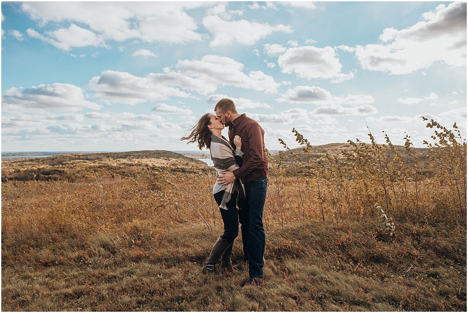 the wide blue sky during their Rockland Maine Engagement Photography