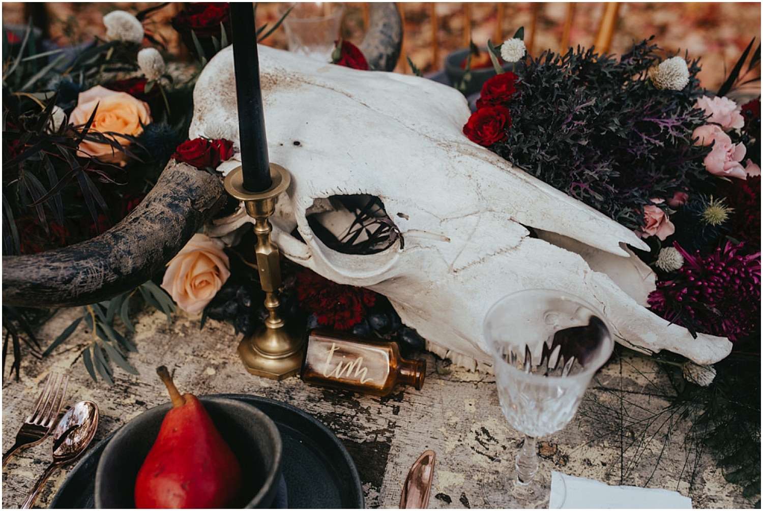 animal skull centerpieces at this halloween wedding inspiration shoot