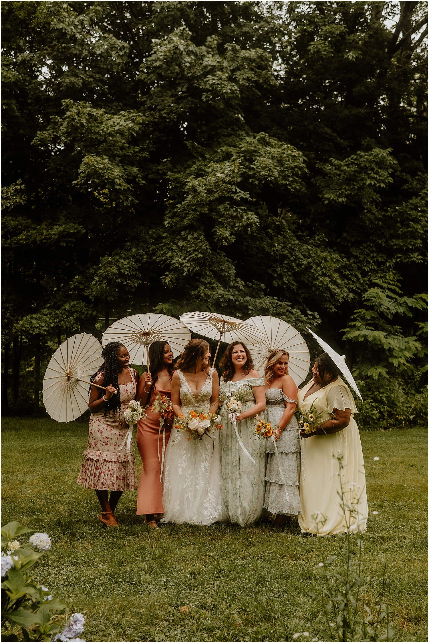 Bride and bridesmaids together at Caswell Farm 