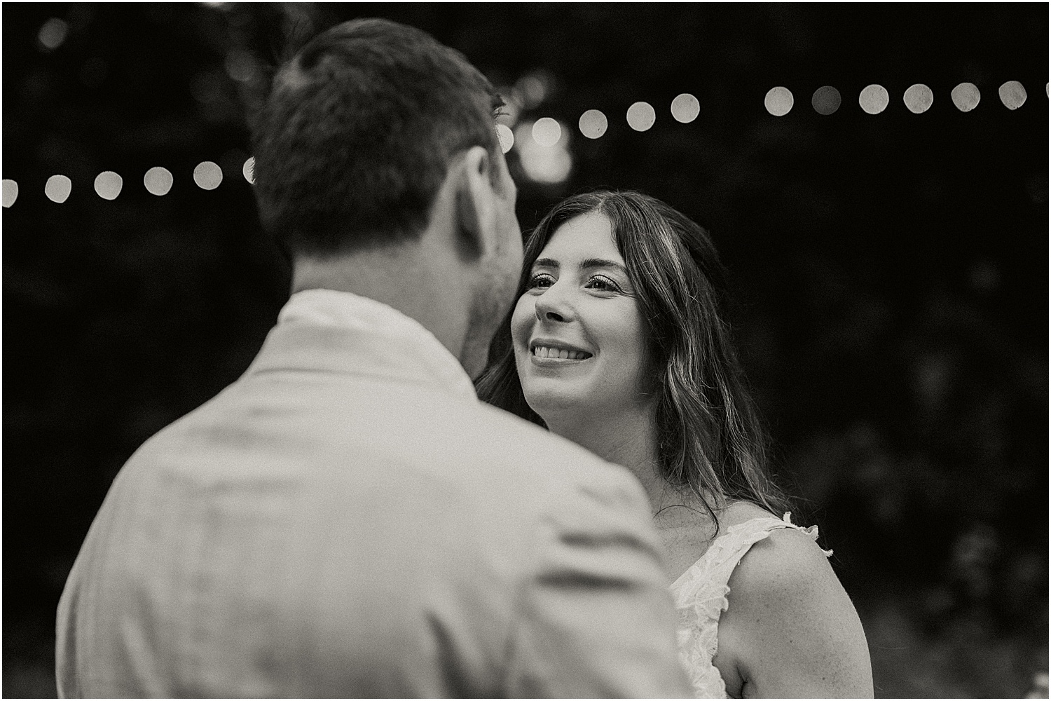 Bride smiles at groom for Katelyn Mallett Photography