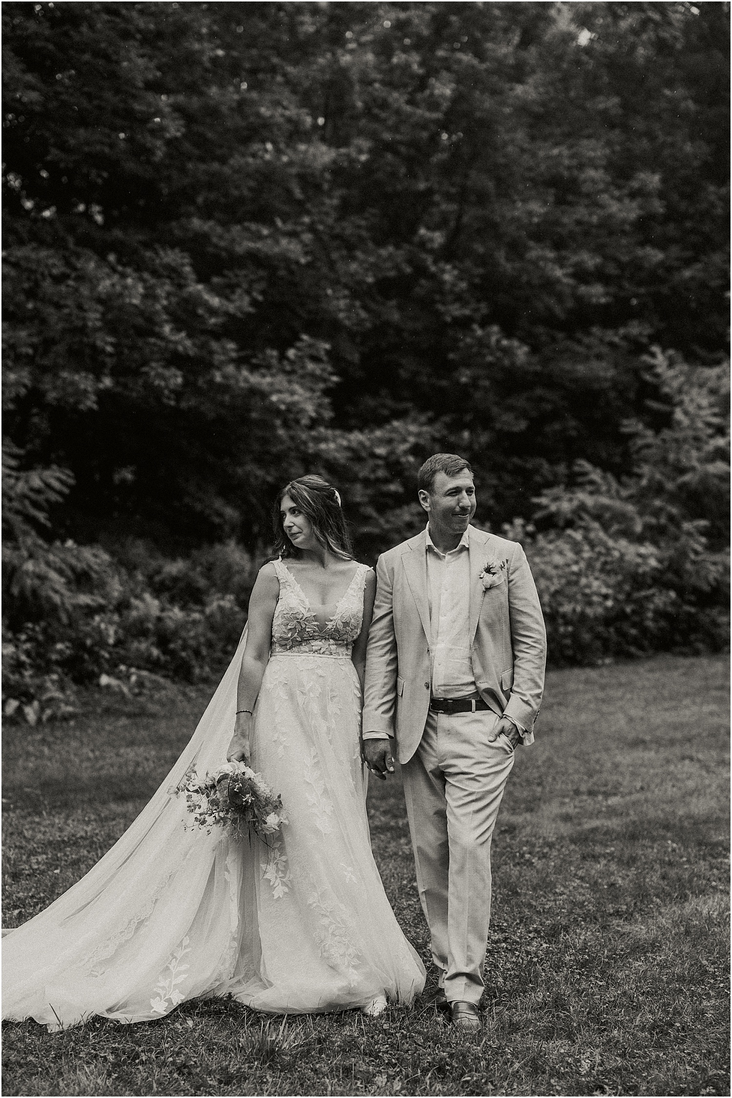 Couple hold hands together for Maine Wedding Photographer