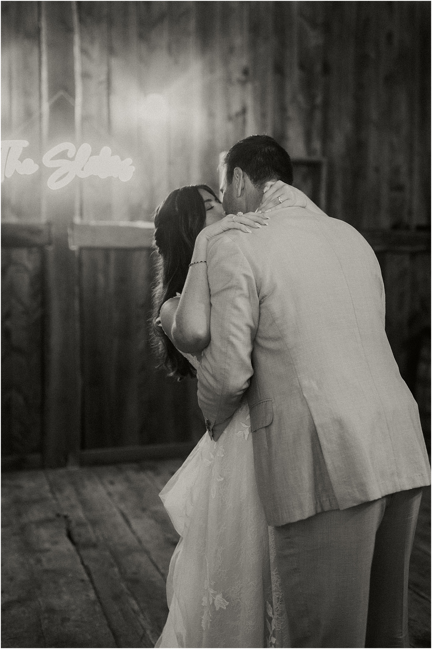 Husband and wife share a kiss for Caswell Farm Wedding Photographer
