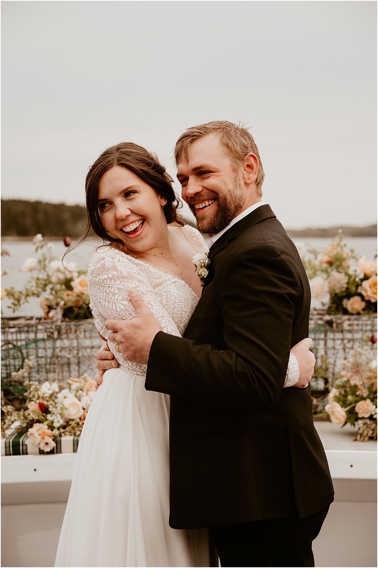 Couple share a big smile on Just Banded Lobster Boat Elopement