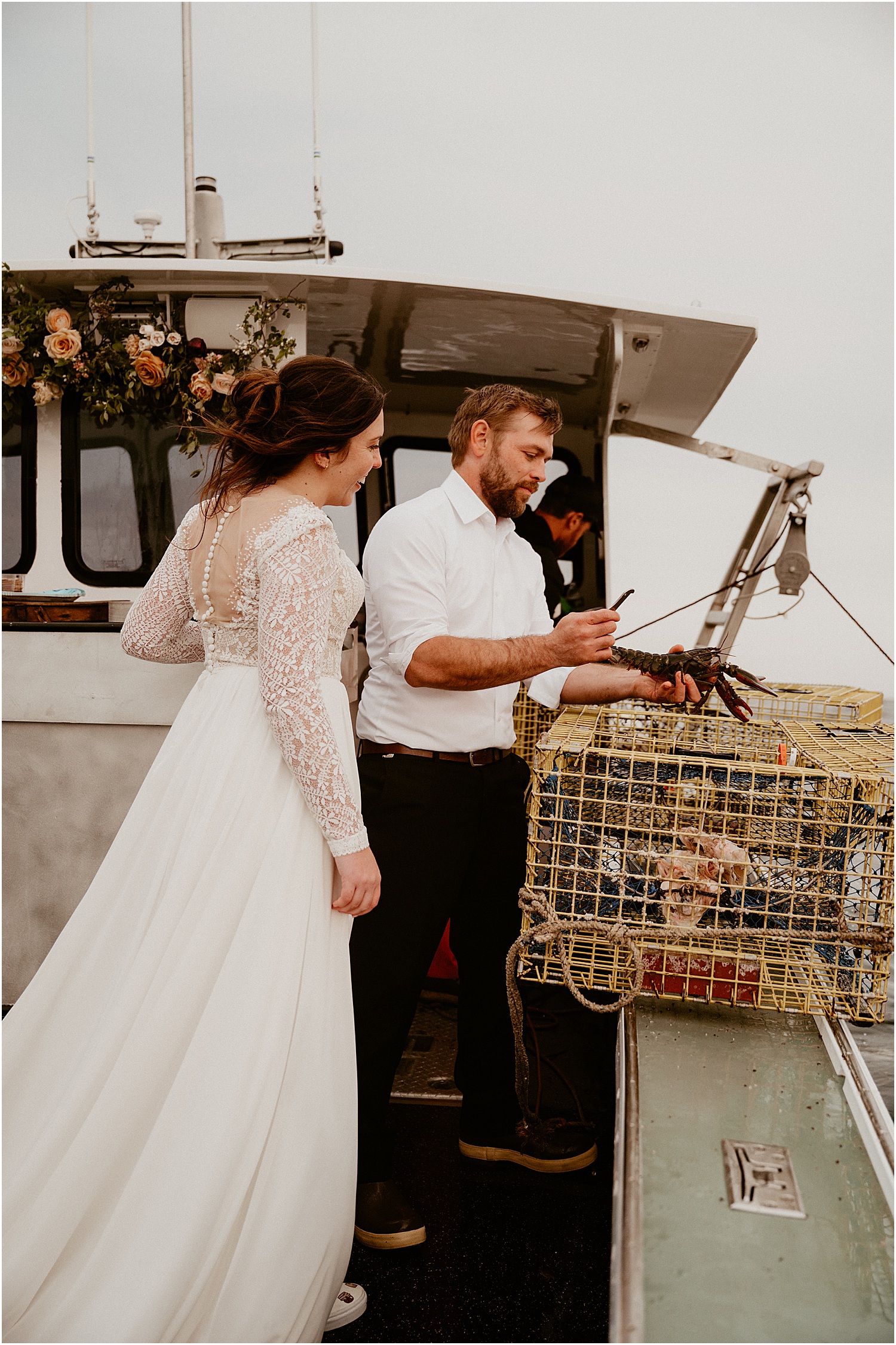 Bride and groom catch lobsters for Katelyn Mallett Photography