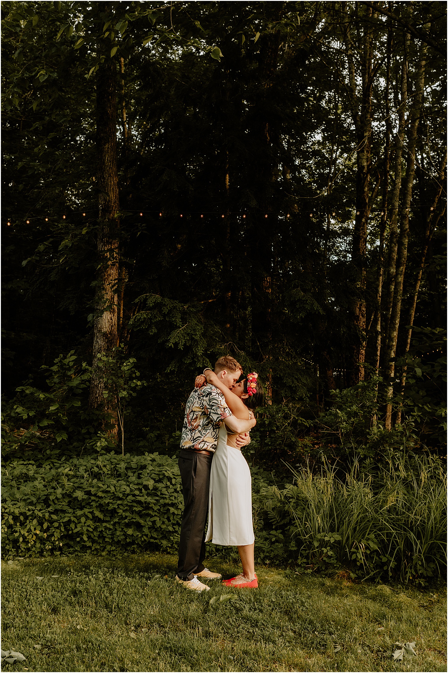 Future husband and wife share a kiss for their Maine barn wedding