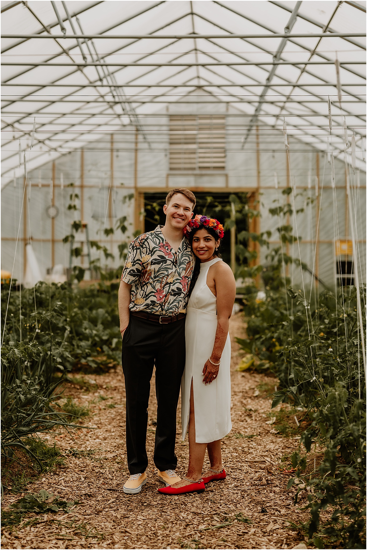 Bride and groom stand together for Maine barn wedding